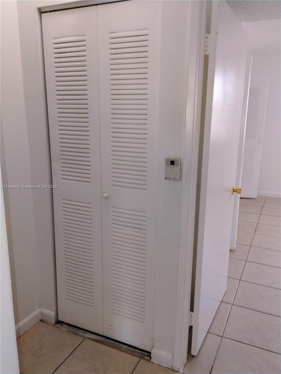 6045 Northwest 186th Street, Unit 304 Hialeah, FL 33015 - Photo 9 of 28