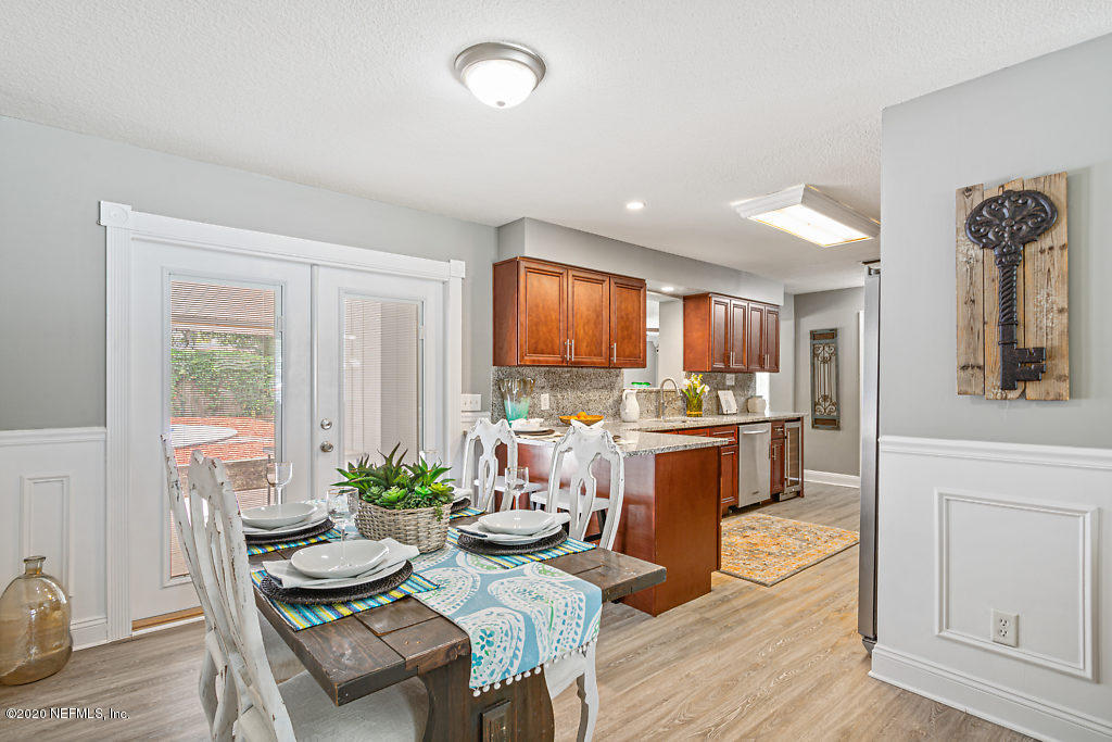 5664 Sabena Road Jacksonville, FL 32207 - Photo 8 of 35 a kitchen with a table and chairs in it