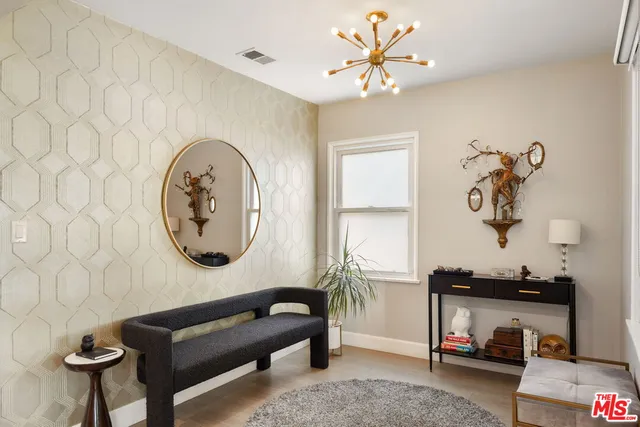 a living room with furniture and a table