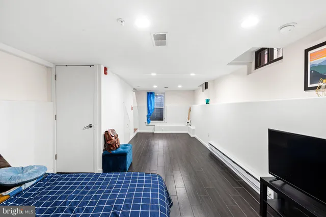 a view of a living room and dining room