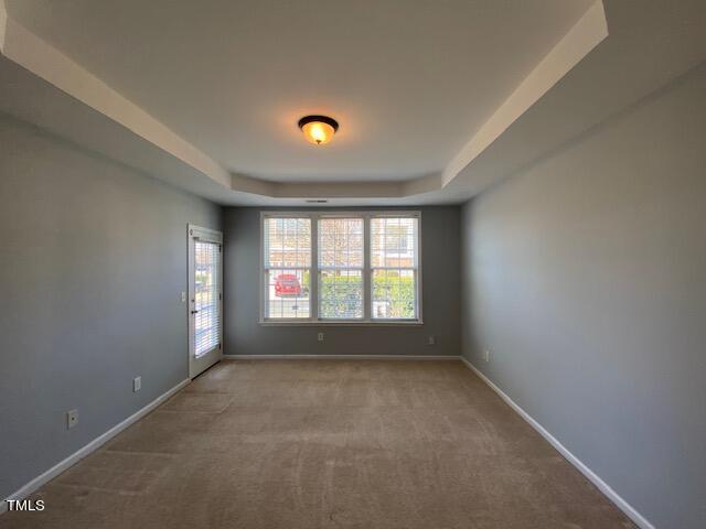 10103 Falls Meadow Court Raleigh, NC 27617 - Photo 12 of 54 an empty room with a window