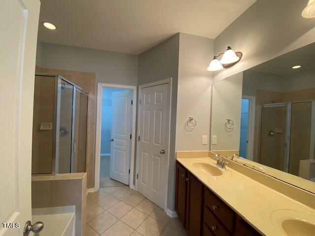 10103 Falls Meadow Court Raleigh, NC 27617 - Photo 13 of 54 a bathroom with a double vanity sink mirror and double