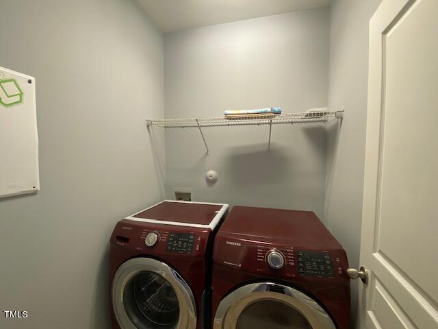 10103 Falls Meadow Court Raleigh, NC 27617 - Photo 25 of 54 a utility room with dryer and washer