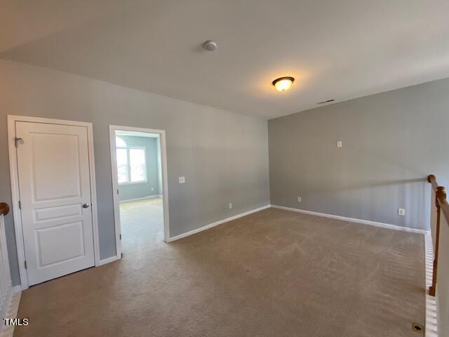10103 Falls Meadow Court Raleigh, NC 27617 - Photo 32 of 54 a view of an empty room