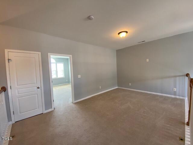 10103 Falls Meadow Court Raleigh, NC 27617 - Photo 33 of 54 a view of an empty room