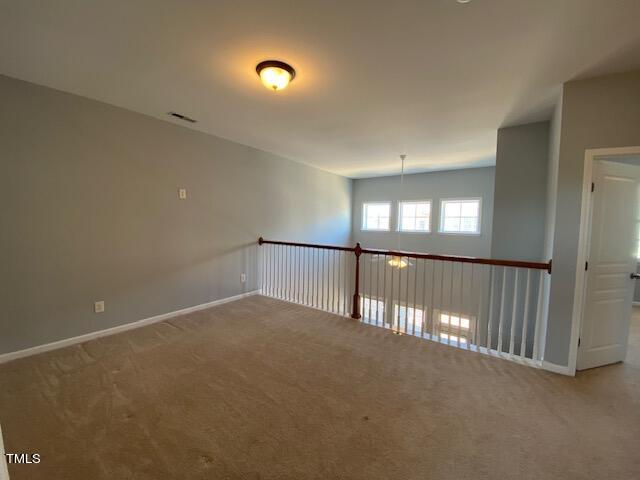 10103 Falls Meadow Court Raleigh, NC 27617 - Photo 34 of 54 a view of an empty room