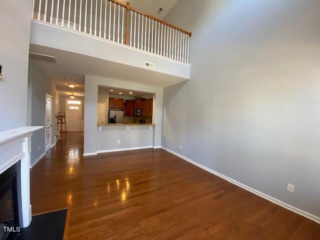 10103 Falls Meadow Court Raleigh, NC 27617 - Photo 5 of 54 a view of a hallway with wooden floor