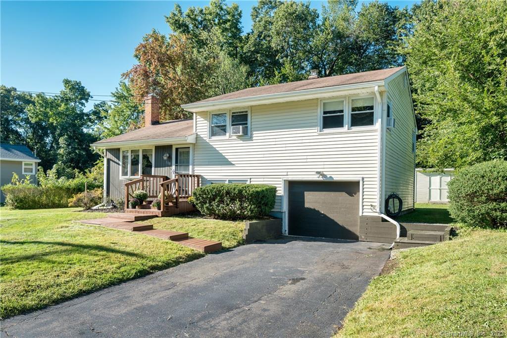 508 5th Ridge Road Wallingford, CT 06492 - Photo 1 of 1 front view of a house with a yard