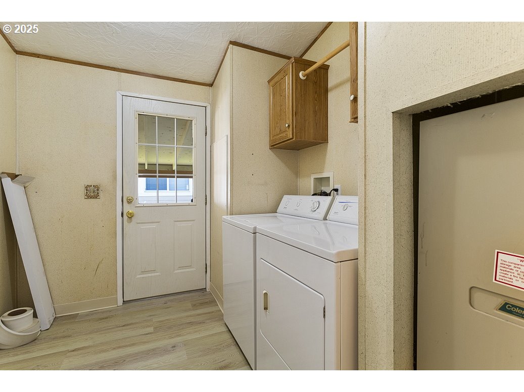 1949 Southeast Palmquist Road, Unit 100 Gresham, OR 97080 - Photo 18 of 28 a utility room with dryer and washer