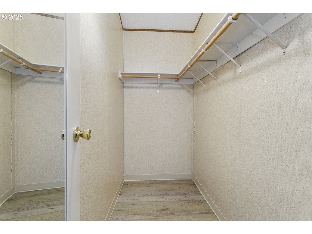 1949 Southeast Palmquist Road, Unit 100 Gresham, OR 97080 - Photo 21 of 28 a view of an empty walk in closet