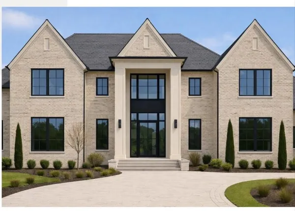 a front view of a house with yard