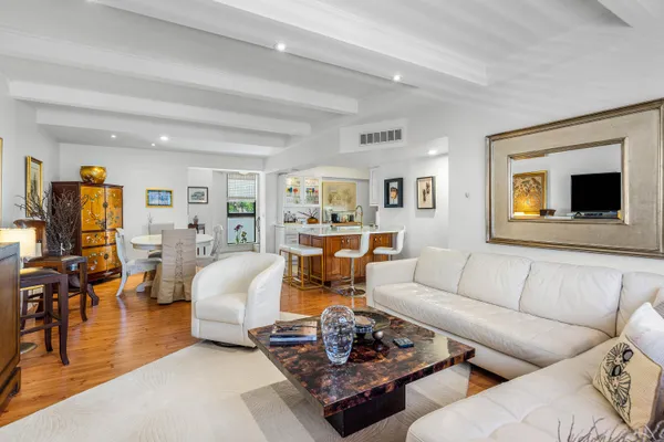 a living room with furniture or couch and a flat screen tv