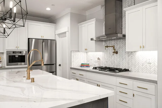 a living room with stainless steel appliances kitchen island granite countertop wooden floor a dining table and chairs