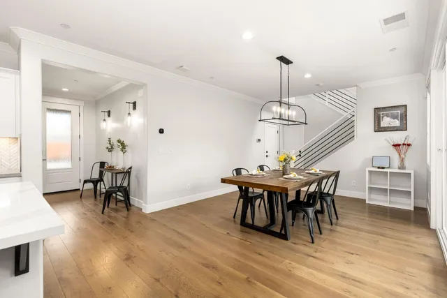 a view of a room with gym equipment and a window