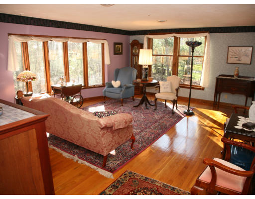 68 Highland Road Boxford, MA 01921 - Photo 7 of 17 a living room with furniture and a floor to ceiling window