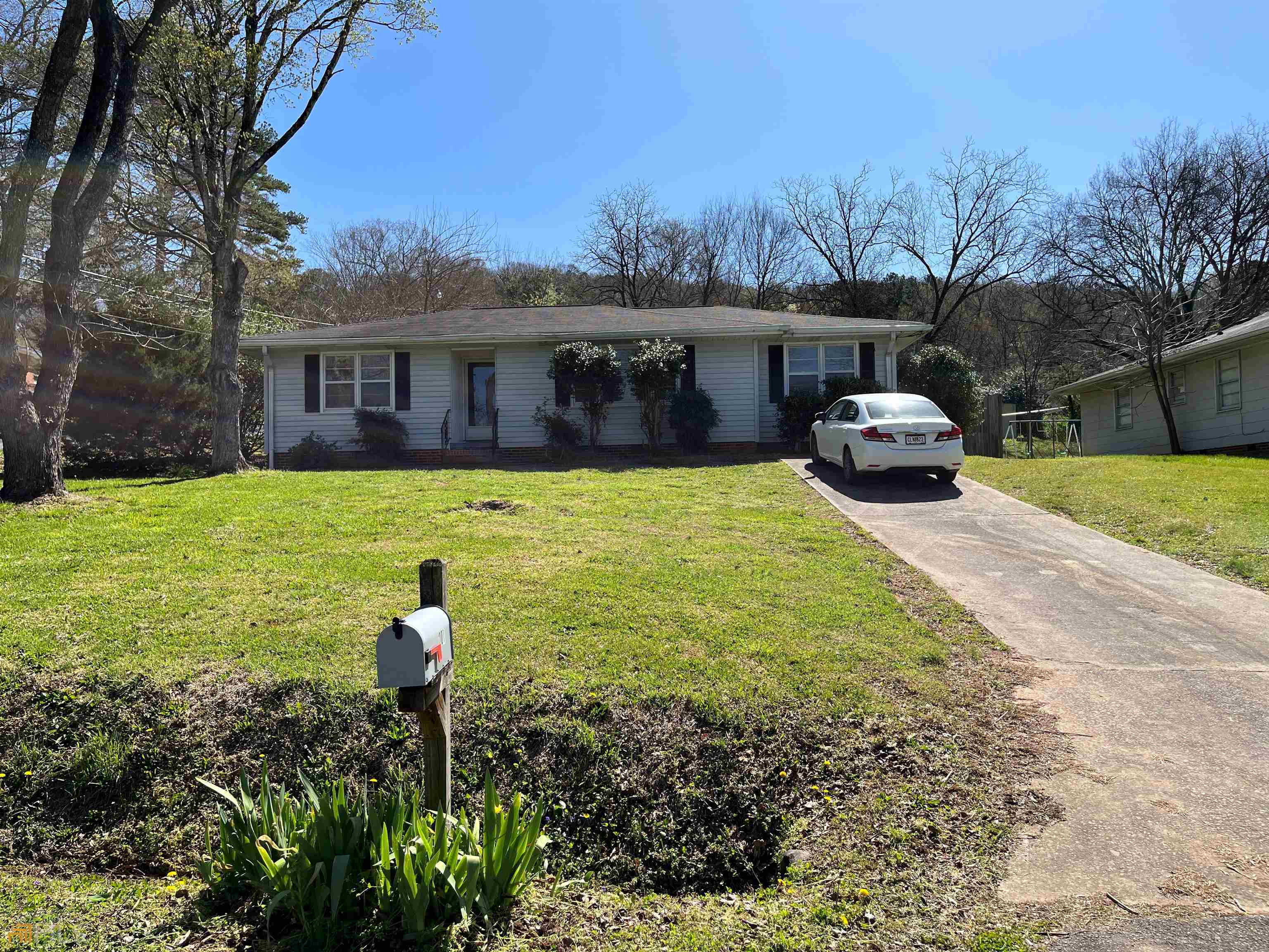 201 Flora Avenue Southeast Rome, GA 30161 - Photo 1 of 1 a view of a house with yard and sitting area