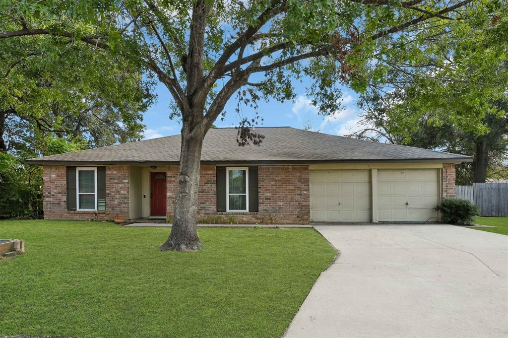 14102 Sylvia Drive Cypress, TX 77429 - Photo 1 of 25 Charming single-story brick home with a spacious front yard, mature tree, and a two-car garage. Ideal for comfortable living in a serene neighborhood.