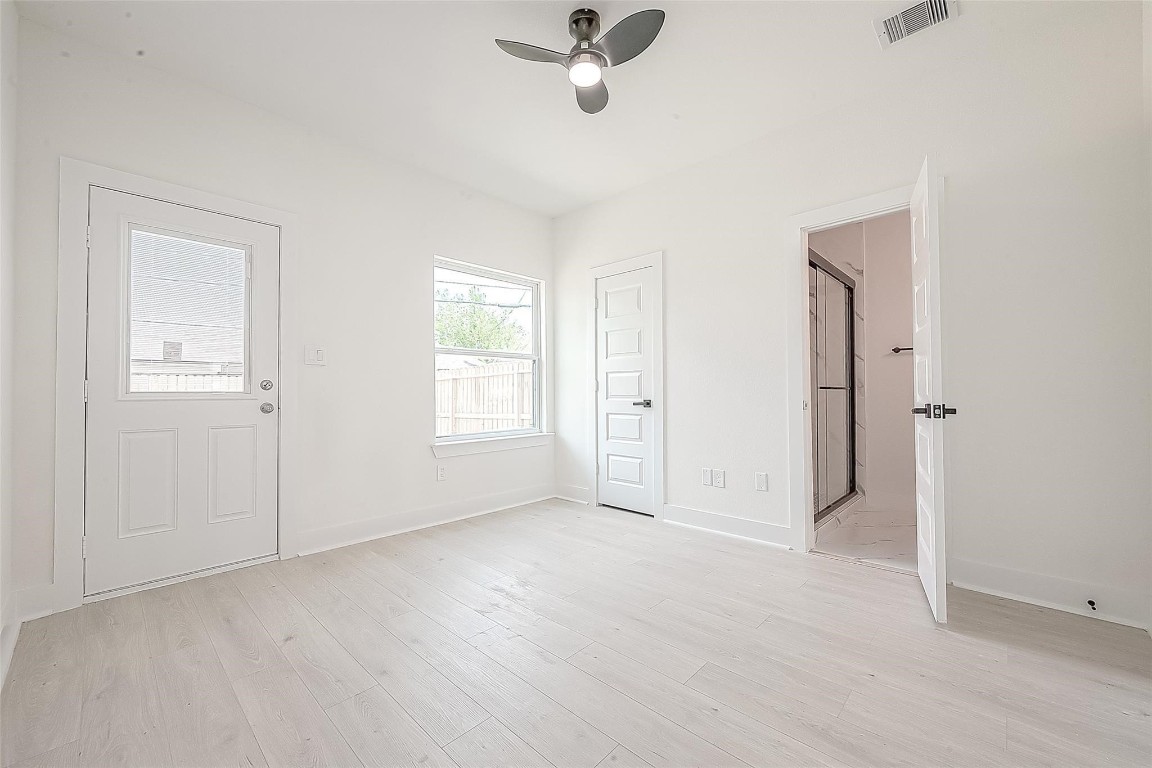 4135 Mallow Street, Unit B Houston, TX 77051 - Photo 11 of 11 an empty room with fan and windows