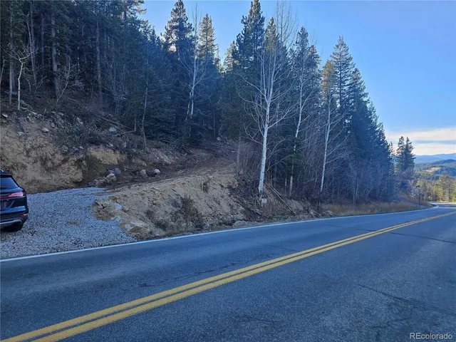 a view of outdoor space and car parked