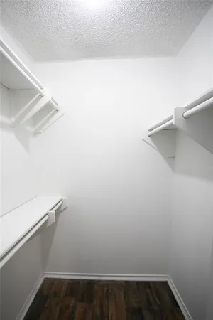 a view of small space with racks on the wall