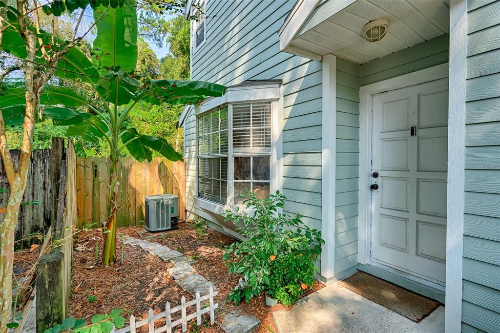 2338 Southwest 73rd Terrace Gainesville, FL 32607 - Photo 24 of 29 a front view of a house with a yard