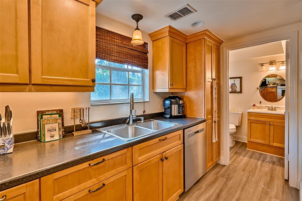 2338 Southwest 73rd Terrace Gainesville, FL 32607 - Photo 9 of 29 a kitchen with a sink and cabinets