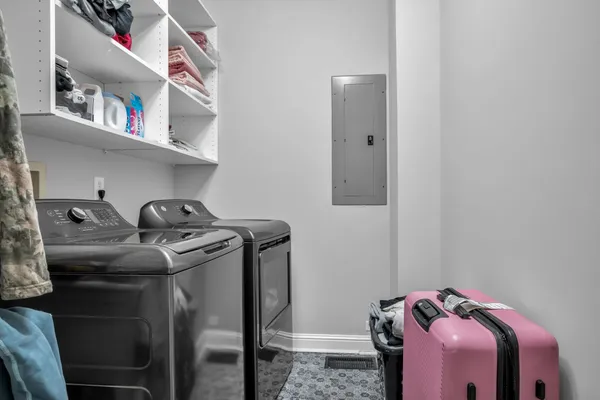 a utility room with dryer and washer