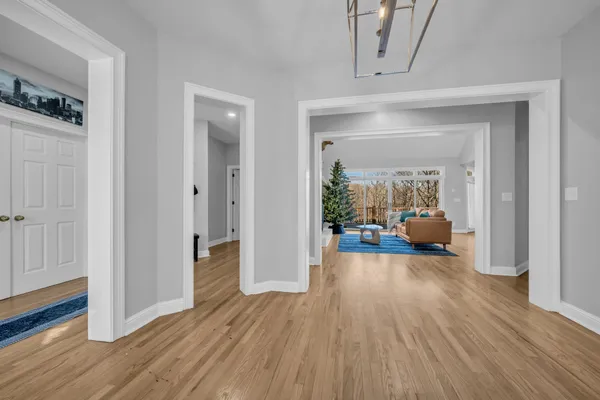 a view of a living room and a wooden floor