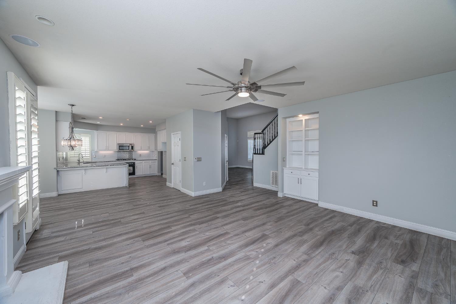 2800 Olympus Court Modesto, CA 95356 - Photo 21 of 56 a view of kitchen with cabinets and wooden floor