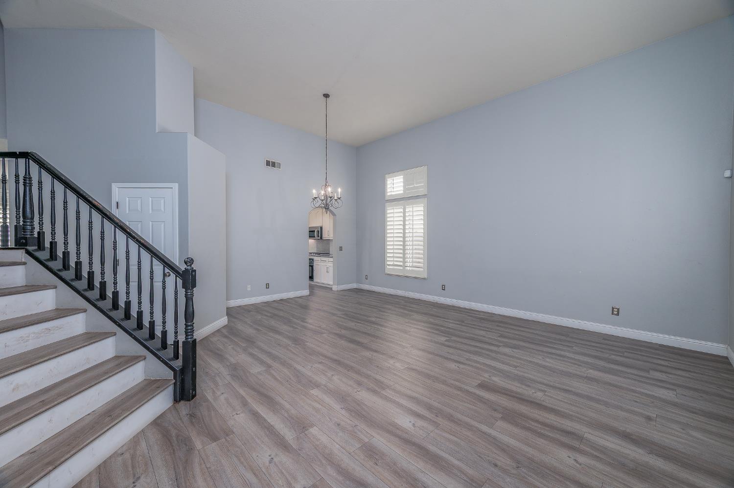 2800 Olympus Court Modesto, CA 95356 - Photo 29 of 56 wooden floor in an empty room with a window