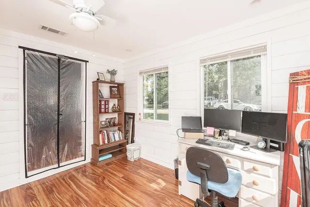 a workspace with furniture window and outside view