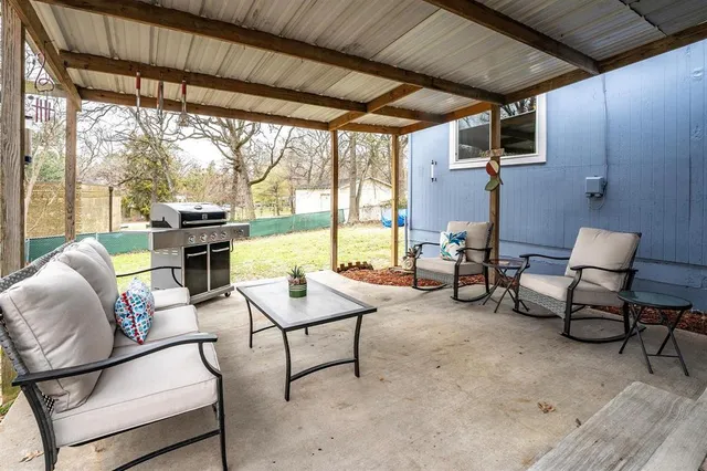 a outdoor living space with furniture