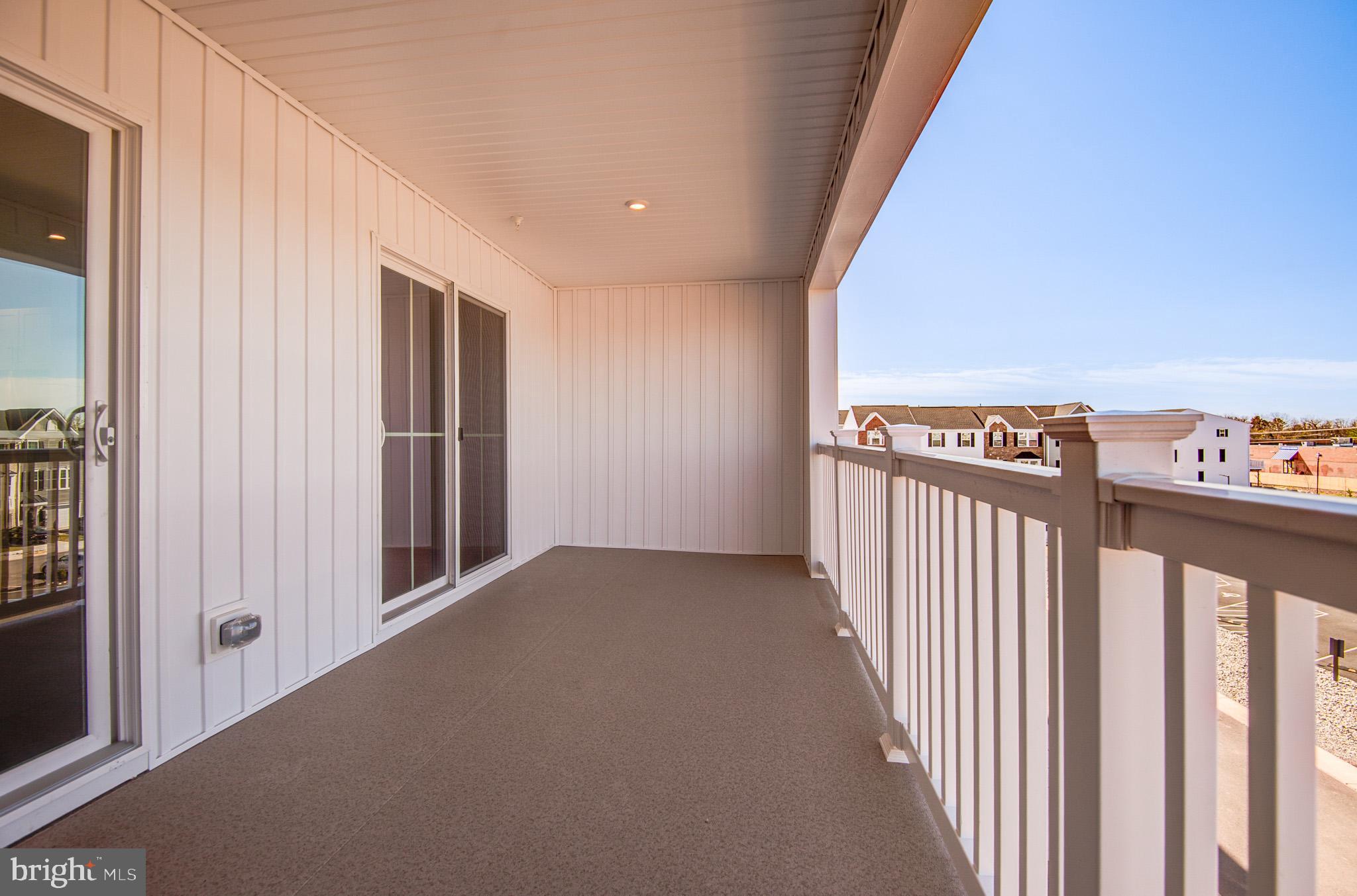 8020 Williamson Boulevard Manassas, VA 20109 - Photo 22 of 53 a view of a hallway with balcony
