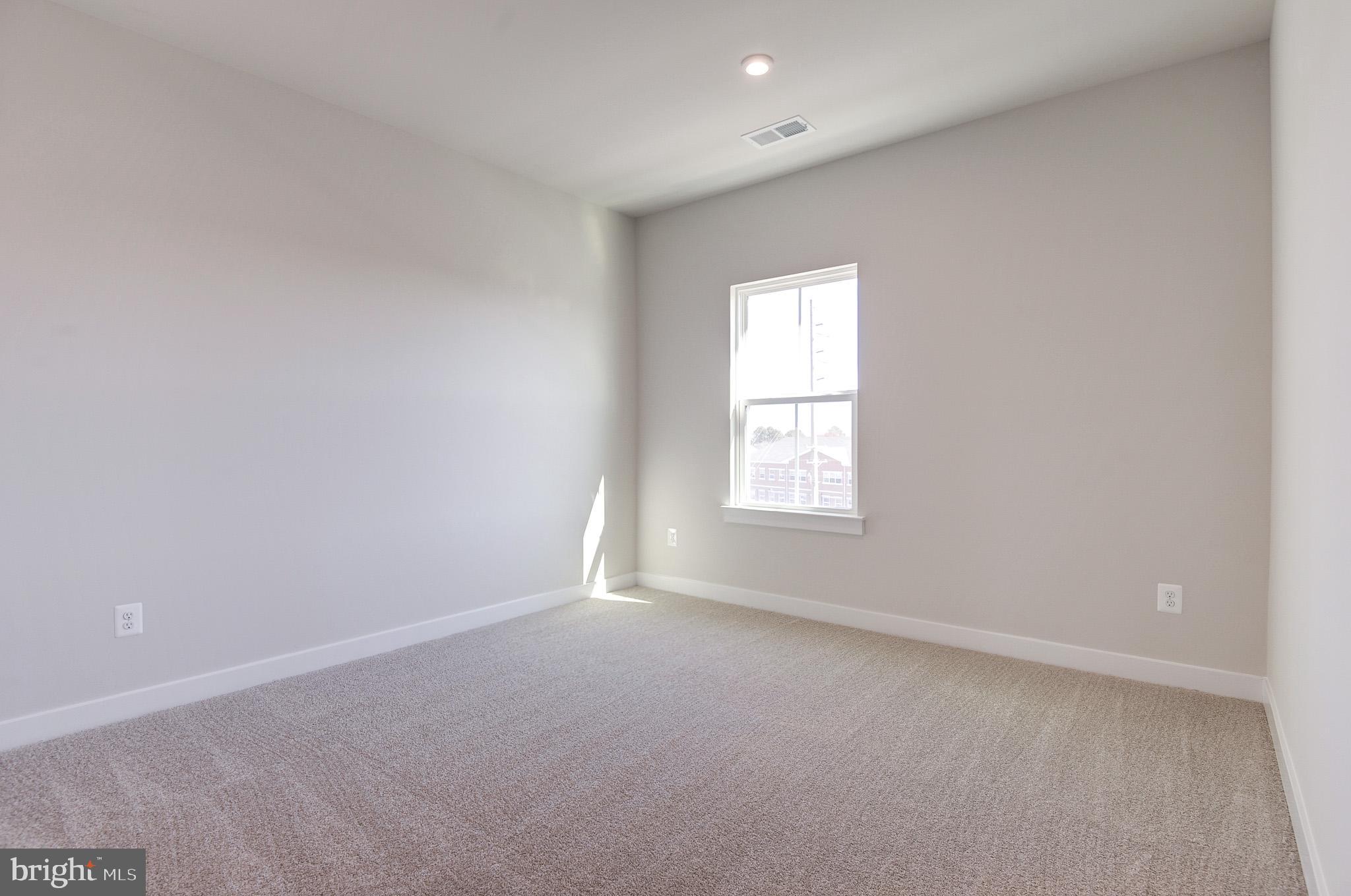8020 Williamson Boulevard Manassas, VA 20109 - Photo 39 of 53 an empty room with a window
