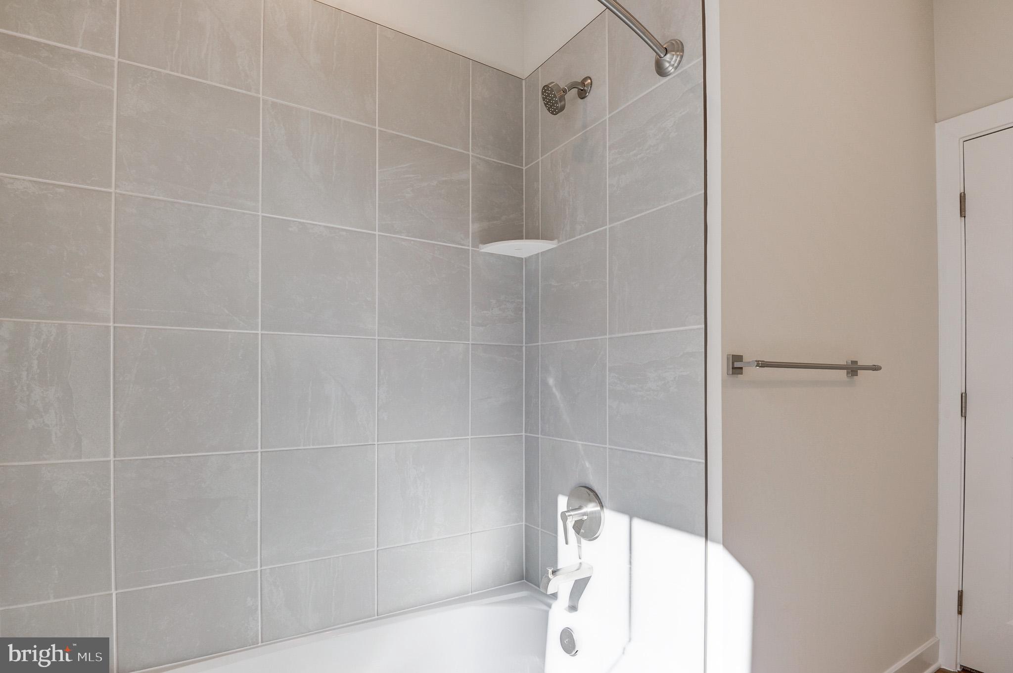 8020 Williamson Boulevard Manassas, VA 20109 - Photo 44 of 53 a bathroom with a bathtub