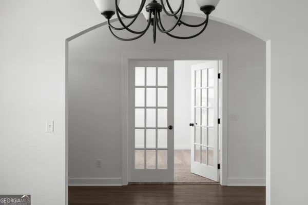 a view of wooden floor with a window
