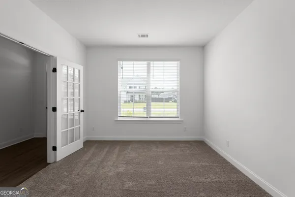 an empty room with a window