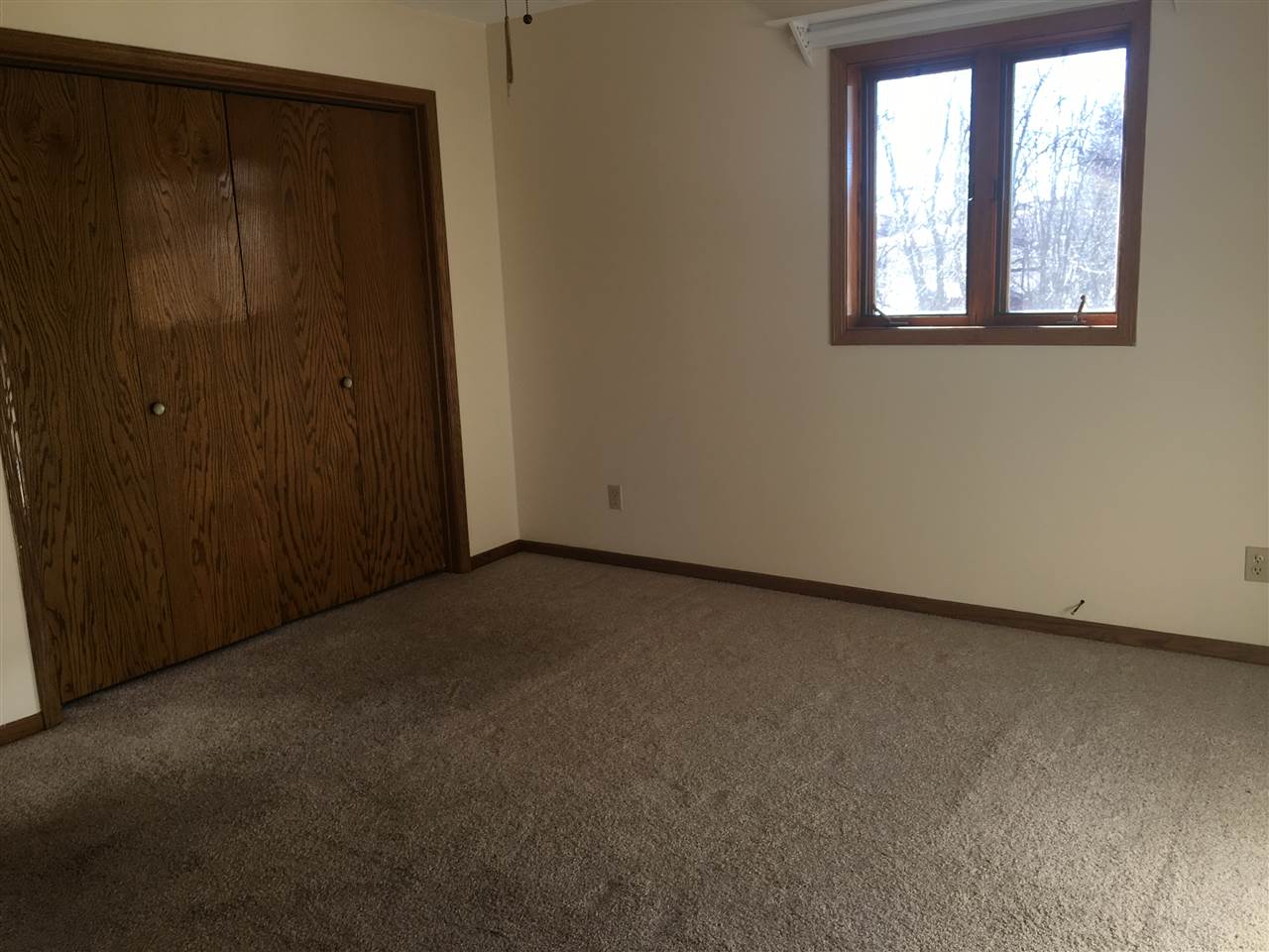 7410 East Maize Road Ridott, IL 61067 - Photo 12 of 25 an empty room with windows