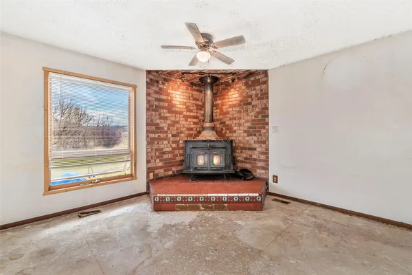 an empty room with windows