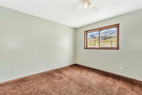 a view of a kitchen with electric appliances