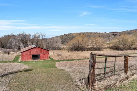 a view of a living room and bathroom