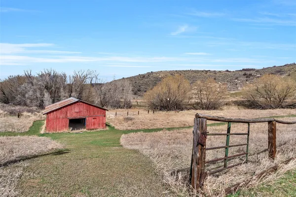 a view of a living room and bathroom