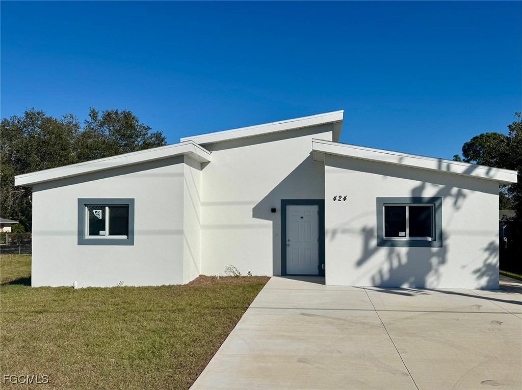 424 Alabama Road South Lehigh Acres, FL 33936 - Photo 1 of 13