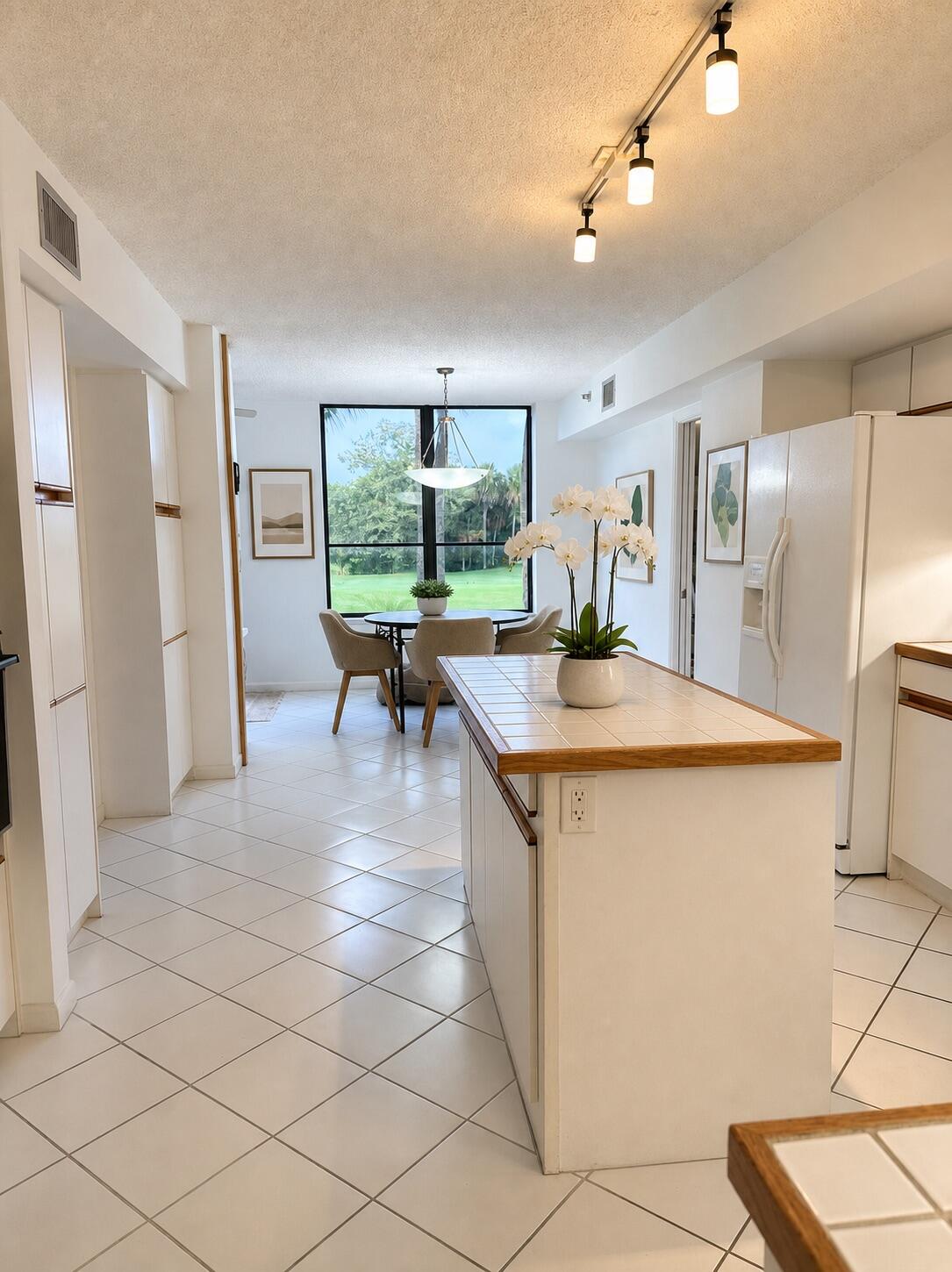 7567 Imperial Drive, Unit 202 Boca Raton, FL 33433 - Photo 7 of 24 kitchen 2