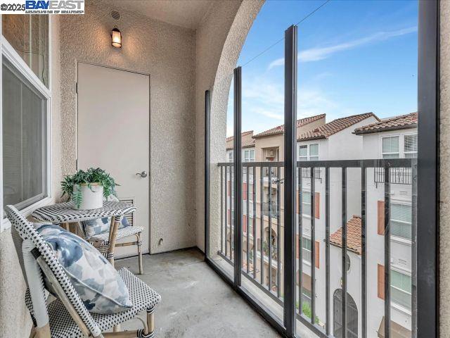 3275 Dublin Boulevard, Unit 408 Dublin, CA 94568 - Photo 15 of 52 a dining room with furniture and a potted plant