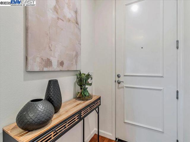 3275 Dublin Boulevard, Unit 408 Dublin, CA 94568 - Photo 23 of 52 a living room with furniture and a potted plant
