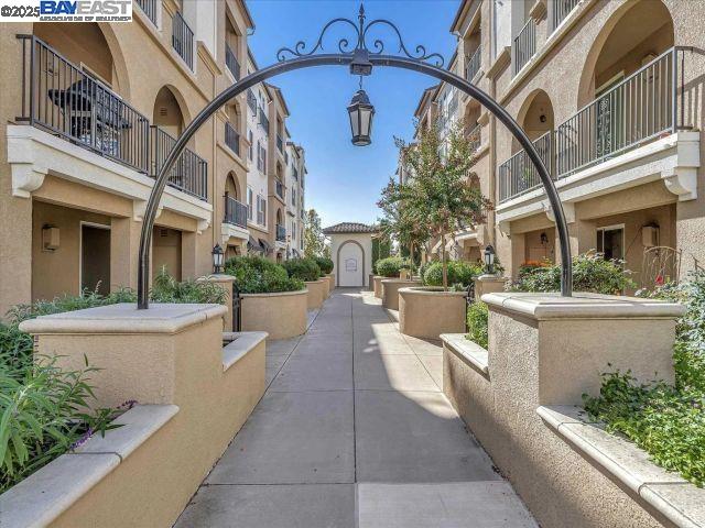 3275 Dublin Boulevard, Unit 408 Dublin, CA 94568 - Photo 35 of 52 a view of a patio with couches and potted plants