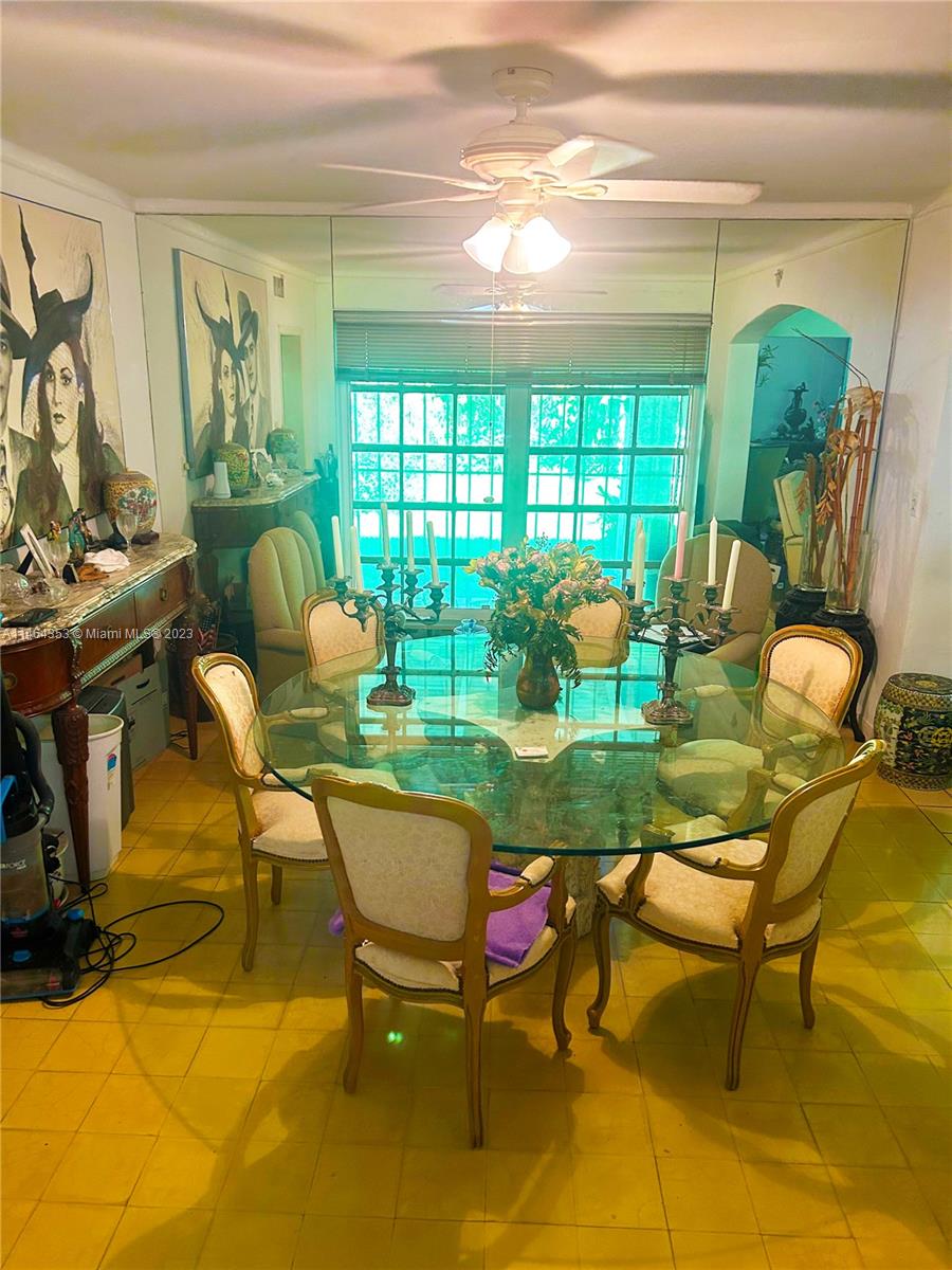 4505 Alton Road Miami Beach, FL 33140 - Photo 5 of 9 a outdoor dining space with furniture