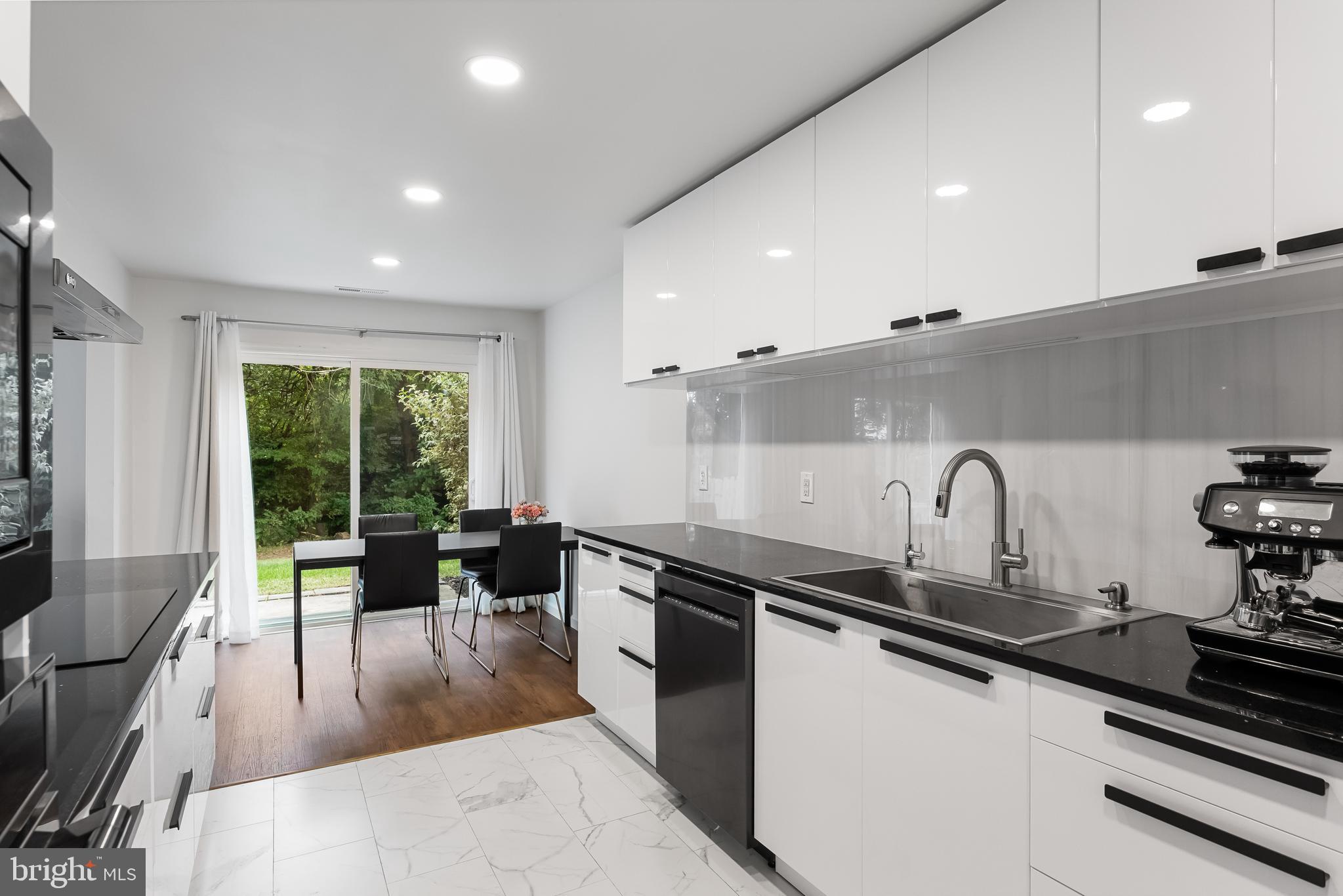 32 Ginger Drive Lumberton, NJ 08048 - Photo 12 of 31 a kitchen with stainless steel appliances a sink a stove and a wooden floors