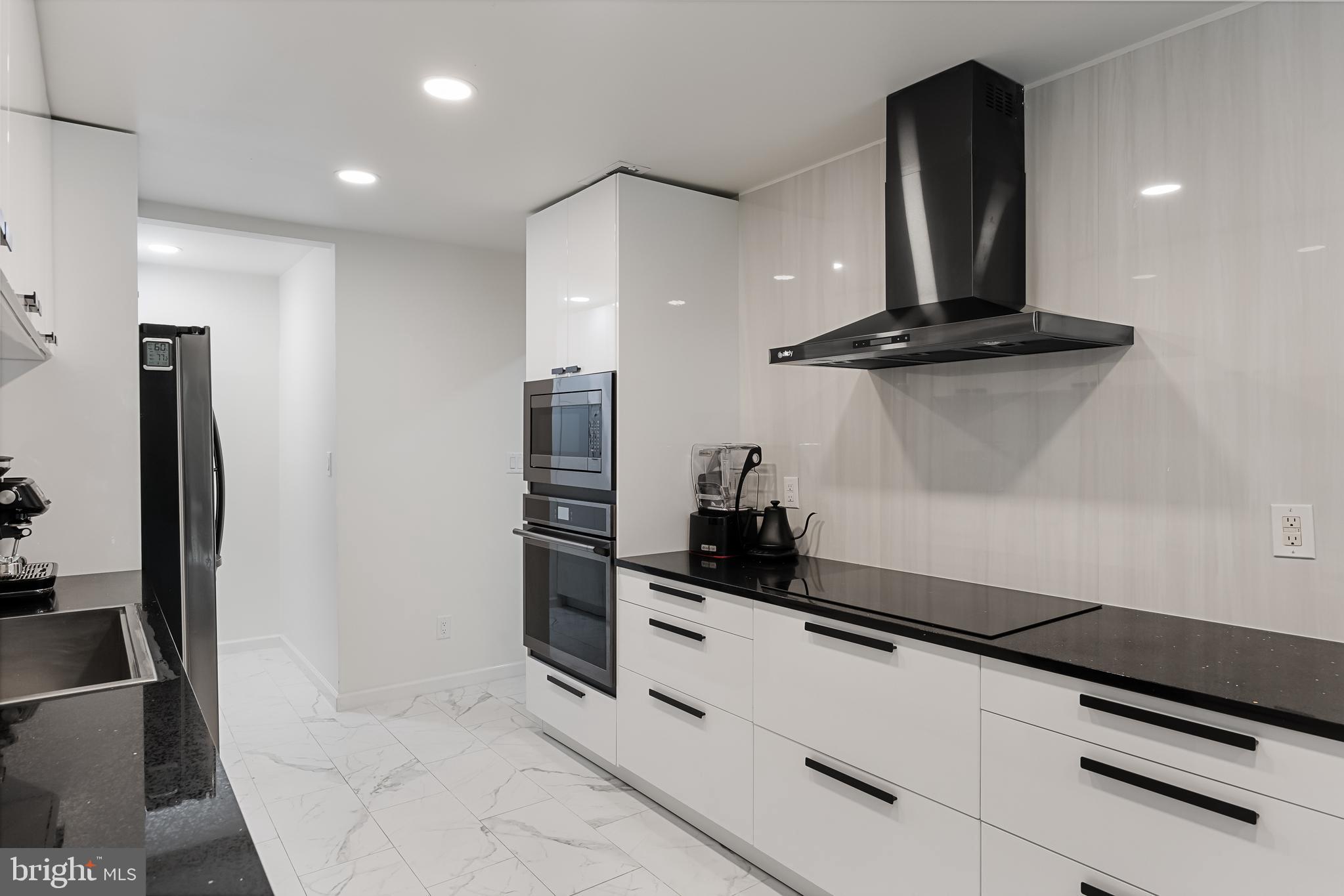32 Ginger Drive Lumberton, NJ 08048 - Photo 14 of 31 a kitchen with stainless steel appliances a refrigerator and a stove top oven